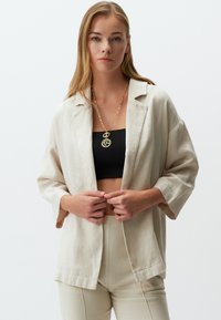 Блейзер Блейзер