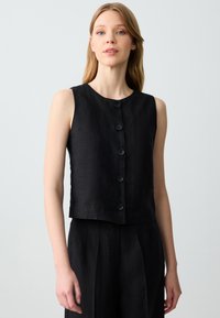 Джинсовая жилетка Джинсовая жилетка