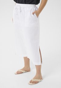 Юбка с накладными карманами Юбка с накладными карманами