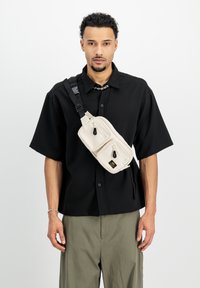 Сумка на пояс Сумка на пояс