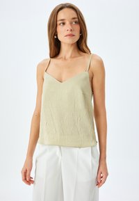 Топ на бретельках Топ на бретельках