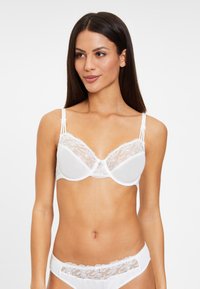 Бюстгальтер на косточках Бюстгальтер на косточках