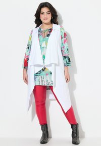 Длинная куртка Длинная куртка