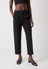 Узкие брюки Узкие брюки