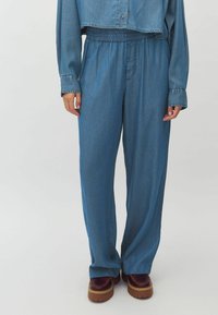 Клешеные джинсы Клешеные джинсы