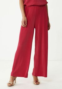 Широкие брюки Широкие брюки