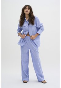 Длинная блузка Длинная блузка