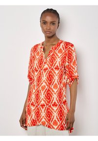 Туника Туника