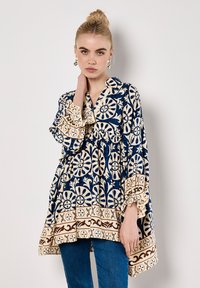 Туника Туника