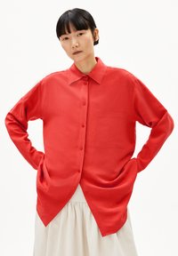 Длинная блузка Длинная блузка