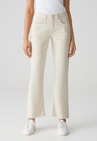 Клешеные джинсы Клешеные джинсы