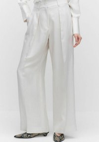 Широкие брюки Широкие брюки