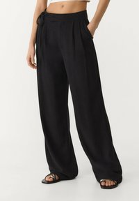 Широкие брюки Широкие брюки