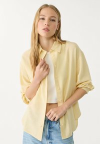 Длинная блузка Длинная блузка