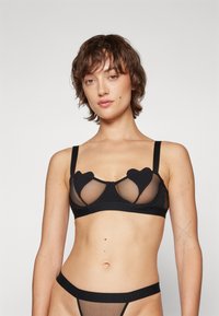 Бюстгальтер на косточках Бюстгальтер на косточках