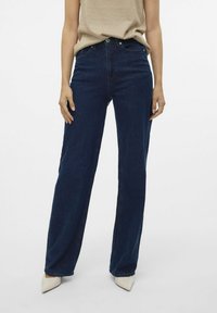 Клешеные джинсы Клешеные джинсы