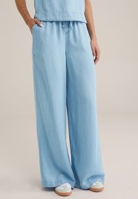 Широкие брюки Широкие брюки