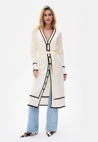 Длинный жилет Длинный жилет