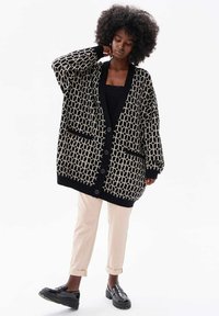 Длинный жилет Длинный жилет