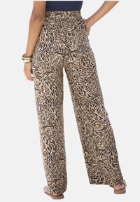 Широкие брюки Широкие брюки