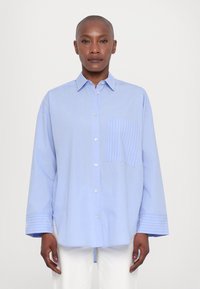 Длинная блузка Длинная блузка