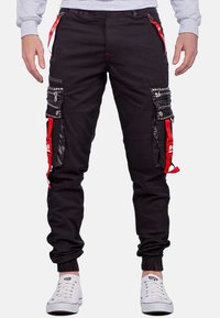 Брюки с накладными карманами Брюки с накладными карманами