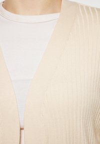 Жилет Жилет