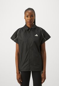 Спортивный жилет Спортивный жилет