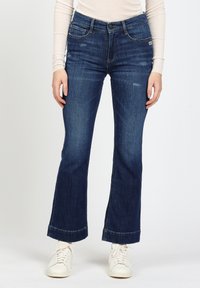 Клешеные брюки Клешеные брюки