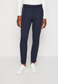 Узкие брюки Узкие брюки