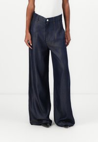 Широкие брюки Широкие брюки