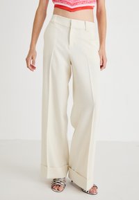 Широкие брюки Широкие брюки