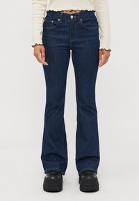 Клешеные брюки Клешеные брюки