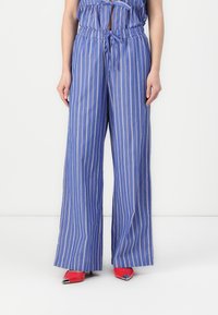 Широкие брюки Широкие брюки