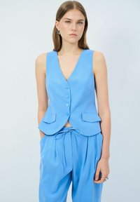 Жилет Жилет