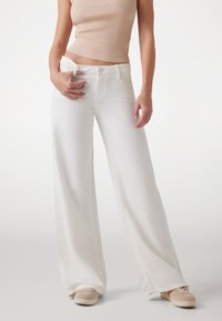 Прямые джинсы Прямые джинсы