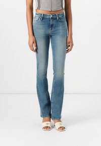 Клешеные брюки Клешеные брюки