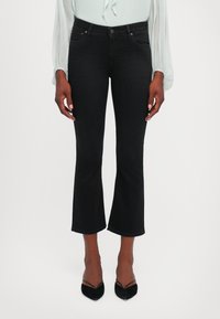 Клешеные джинсы Клешеные джинсы