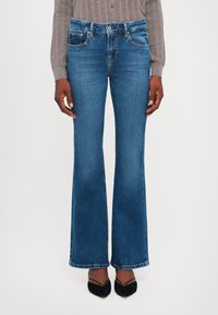 Клешеные брюки Клешеные брюки