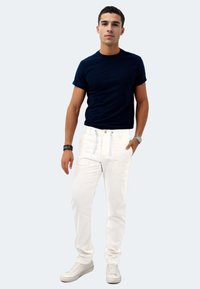 Льняные брюки Льняные брюки