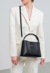 Кожаная сумка Кожаная сумка