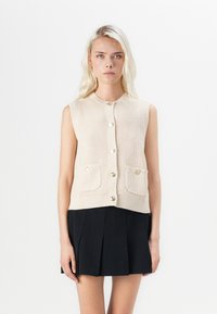 Джинсовая жилетка Джинсовая жилетка