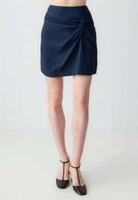 Мини-юбка Мини-юбка