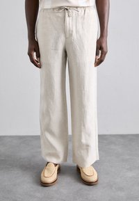 Льняные брюки Льняные брюки