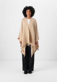 Длинная куртка Длинная куртка