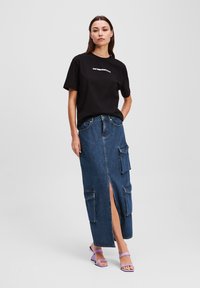 Юбка с накладными карманами Юбка с накладными карманами