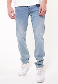 Узкие джинсы Узкие джинсы