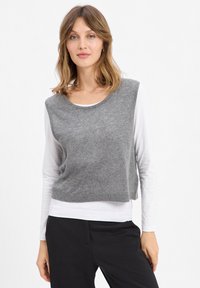 Жилет Жилет