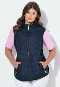 Стеганый жилет Стеганый жилет