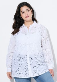 Длинная блузка Длинная блузка